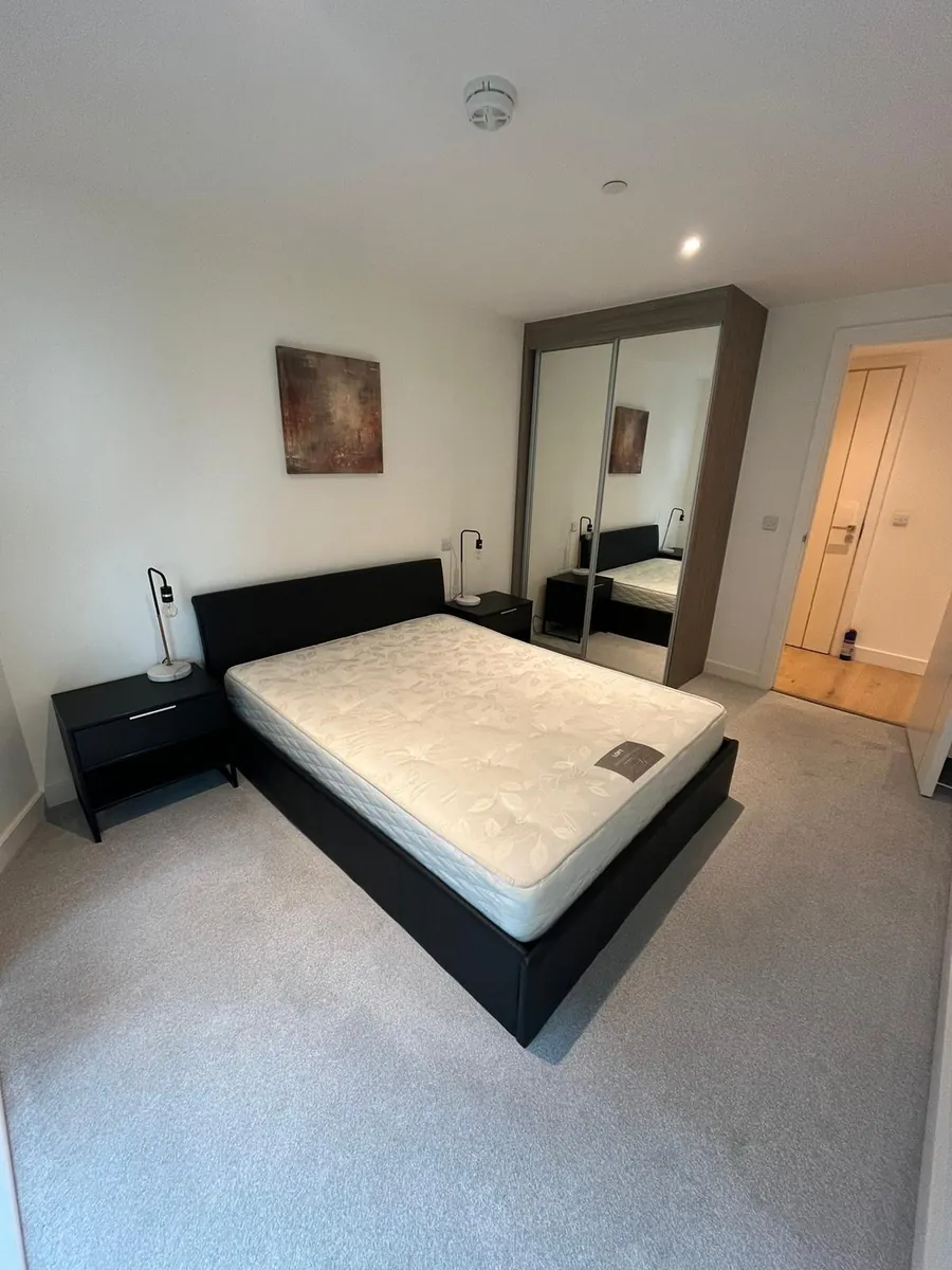 Freshly cleaned grey carpet in a London bedroom